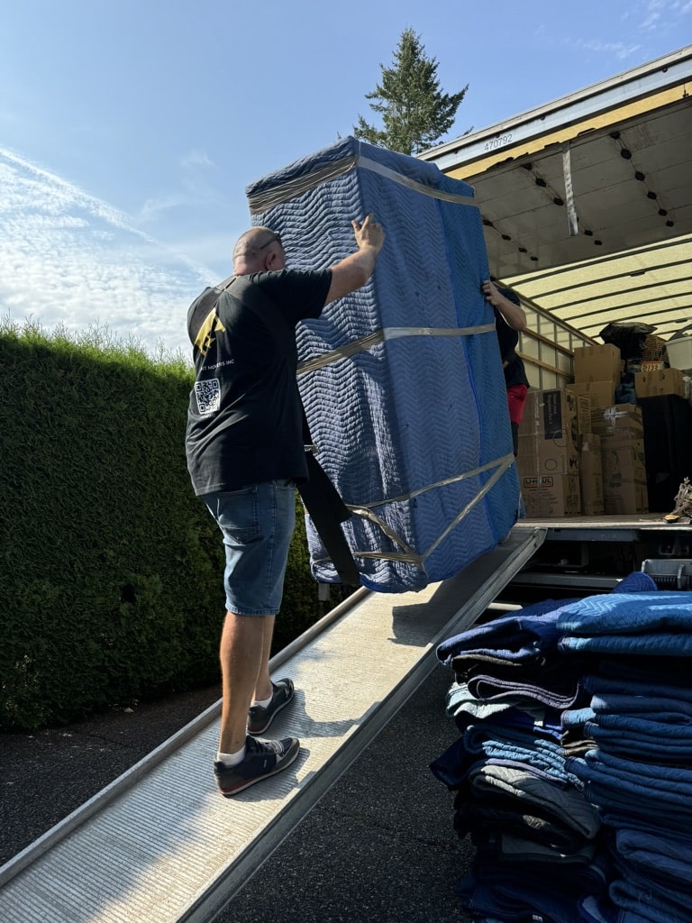 Furniture wrapped and protected for a Vancouver to Calgary long-distance move