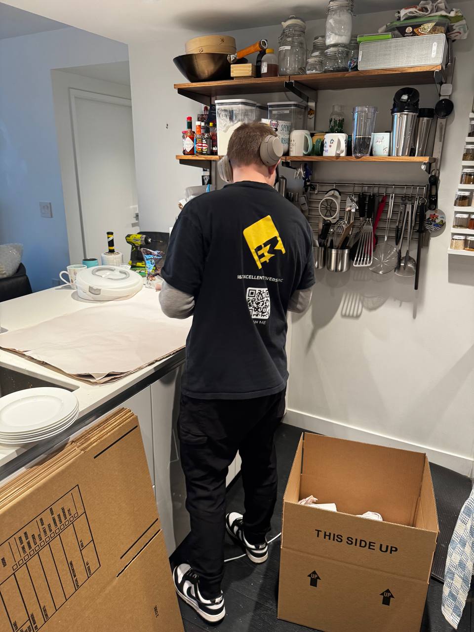 Professional movers packing household items for a local move in Vancouver BC